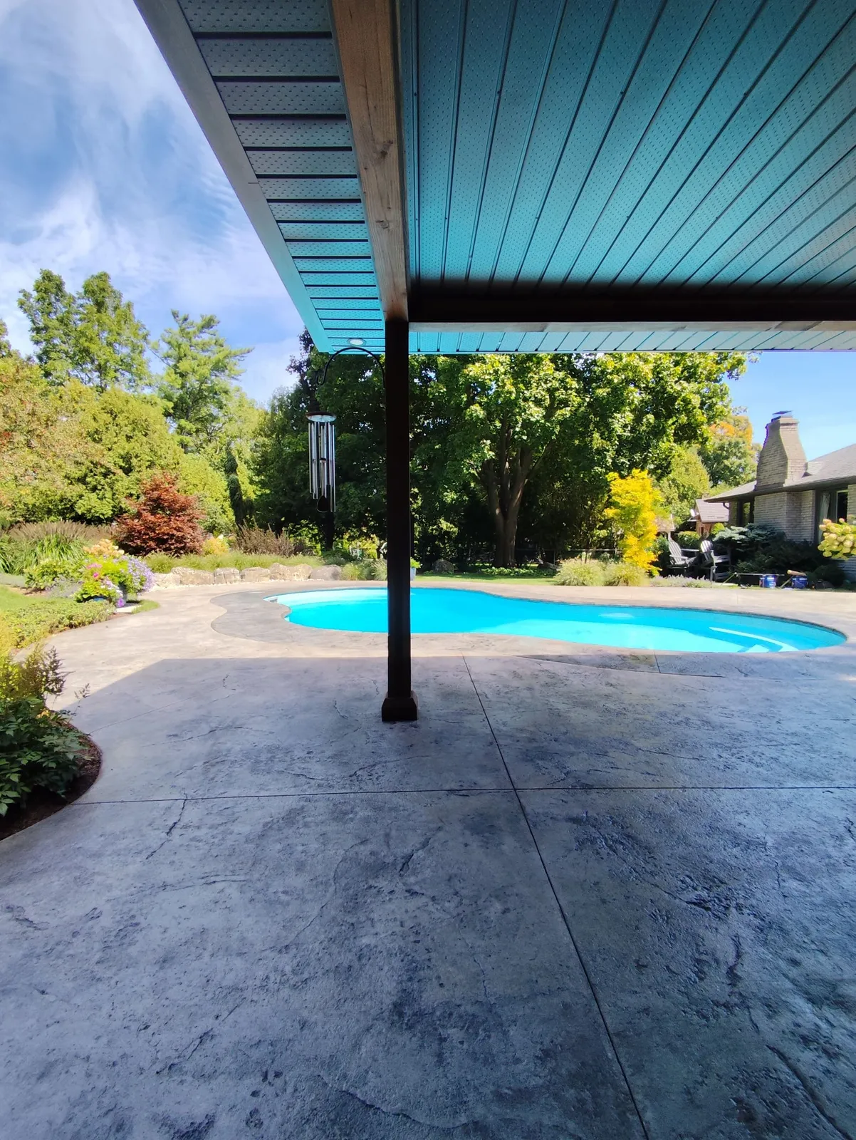 Sealed stamped concrete pool deck